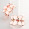 Flower shaped stud earrings - with multicolor zircon - rose gold