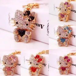 Kitty cristal - coeur - noeud - porte-clés