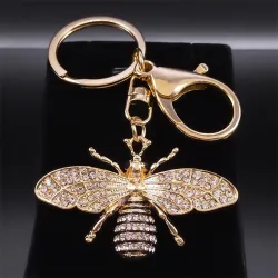 Porte-clés doré avec une abeille en cristal